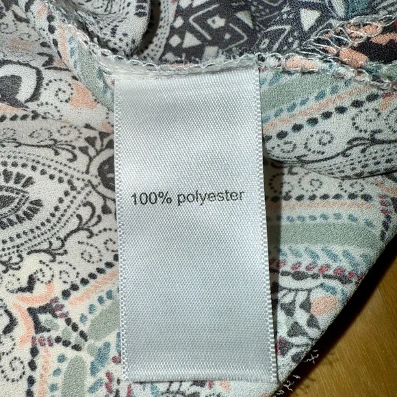 Maurices White and Green Blouse with Playful Pattern and Short Sleeves - Picture 9 of 10